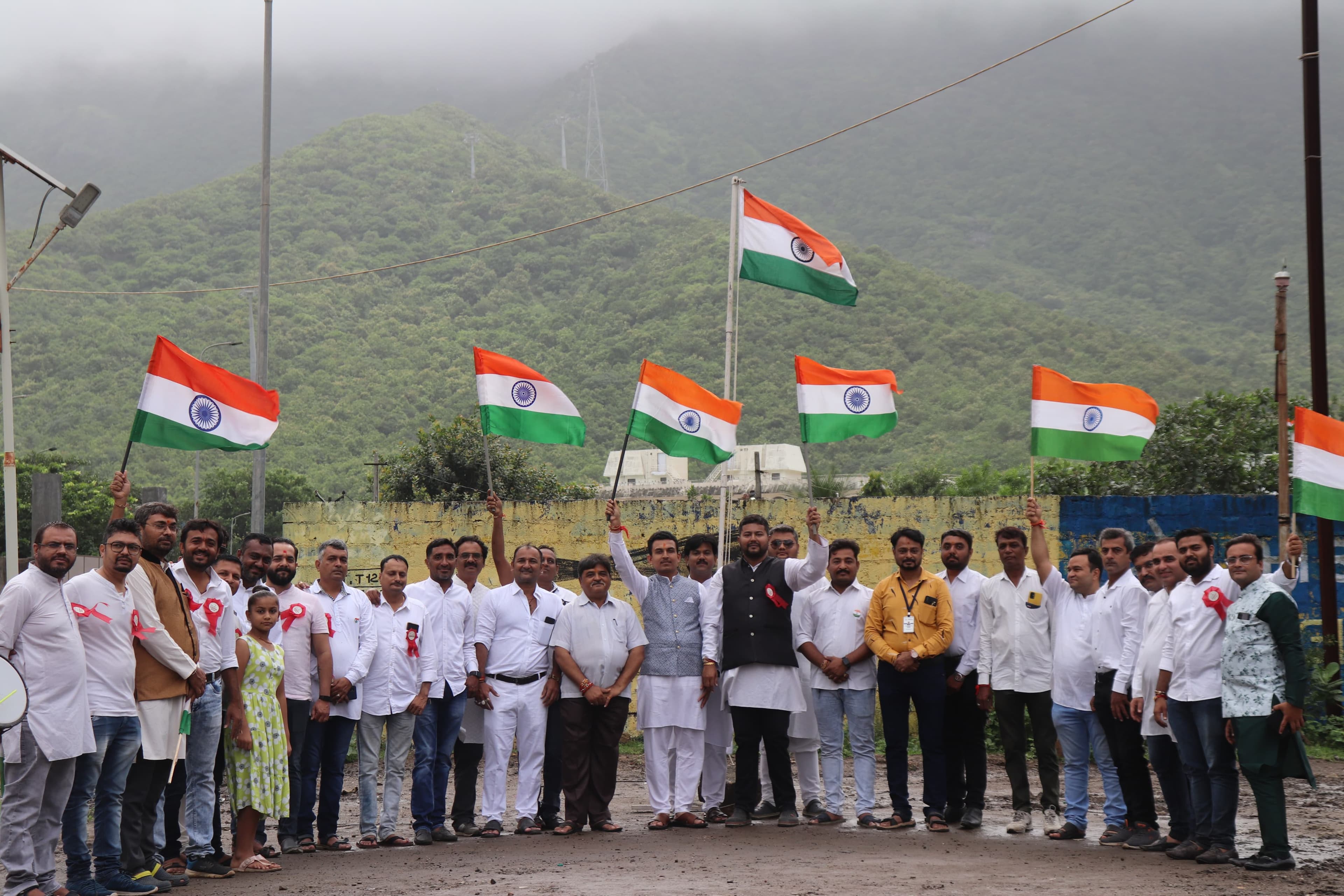 Prasthan Group members holding Indian flags